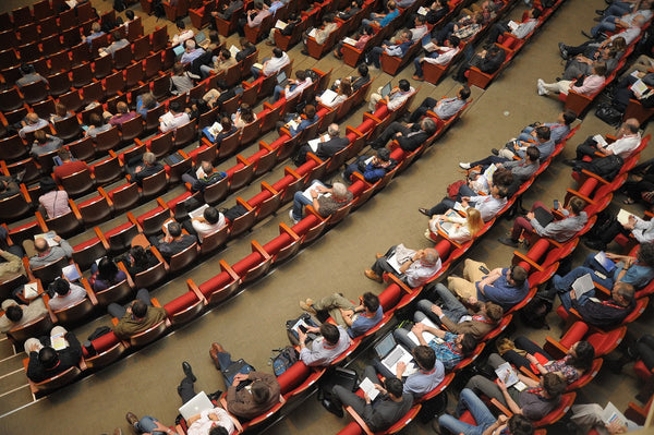 Auditorium seating with attendees.