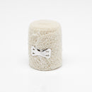 Rolled elastic bandage with metal clips.