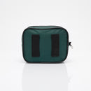 Green rectangular bag with black straps.
