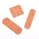 Three adhesive bandages.