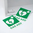 Two green AED signs.
