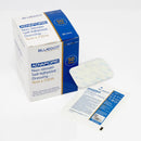 Box of non-woven self-adhesive dressings.