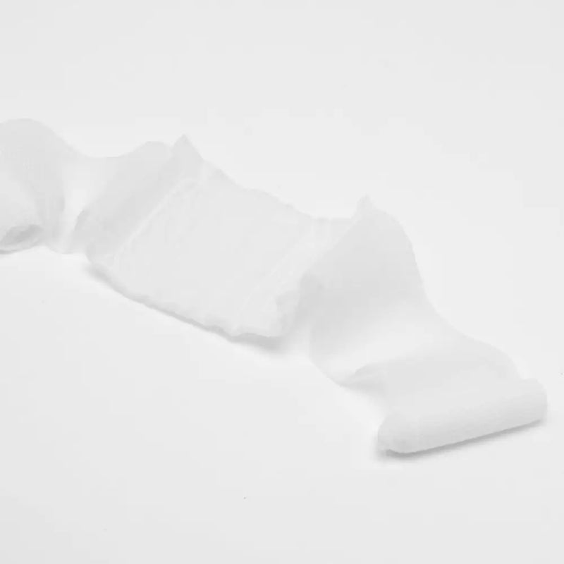 White, crinkled bandage.